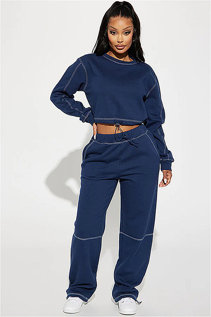Sporty zip sweater for ladies with ruffled hem and loose fit Lune London