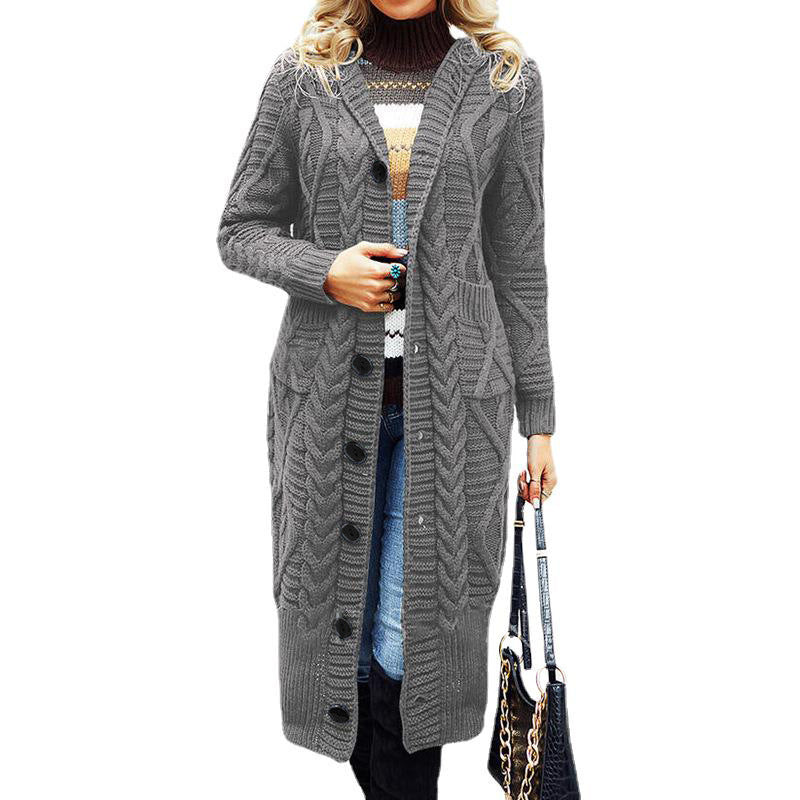 Chunky knit coat for women with practical pockets and elegant cable pattern Lune London