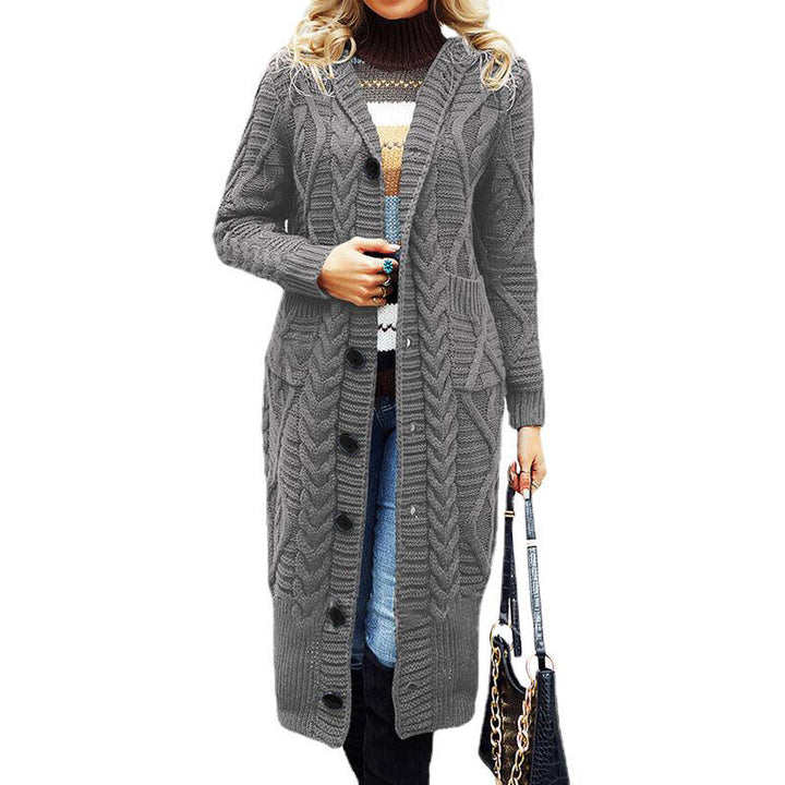 Chunky knit coat for women with practical pockets and elegant cable pattern Lune London