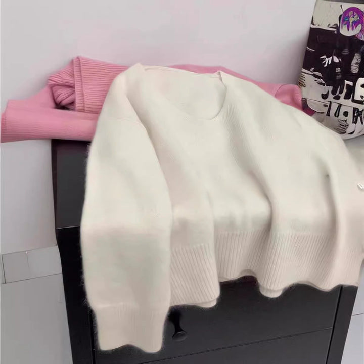 Femme élégant pull V en col avec structure côtelée et coupe décontractée Chic & Stil