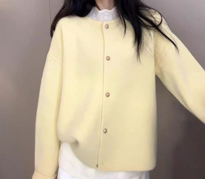 Women's chunky knit cardigan with elegant button placket and relaxed fit Lune London