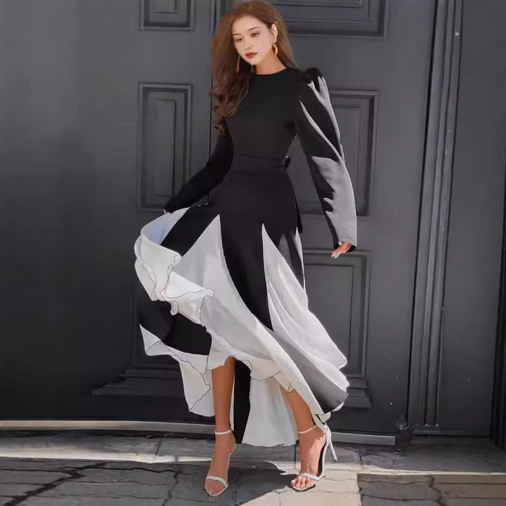 Elegant long dresses for women with puff sleeves and a flowing hem Lune London