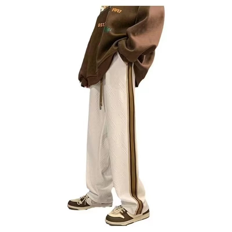 Women's leisure pants with textured design and side stripes Chic & Stil