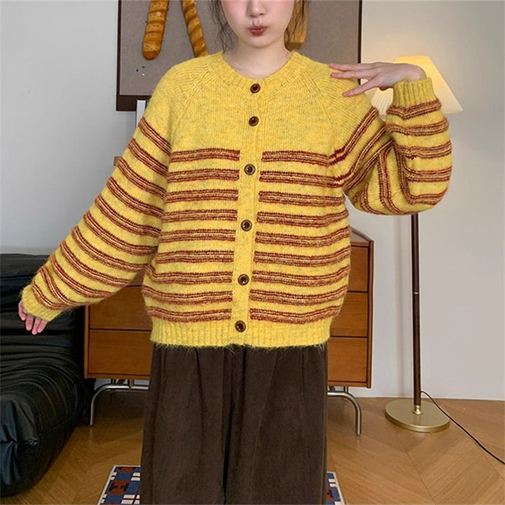 Ladies Chunky Knit Jacket with Modern Stripes and Chic Button Details and Style