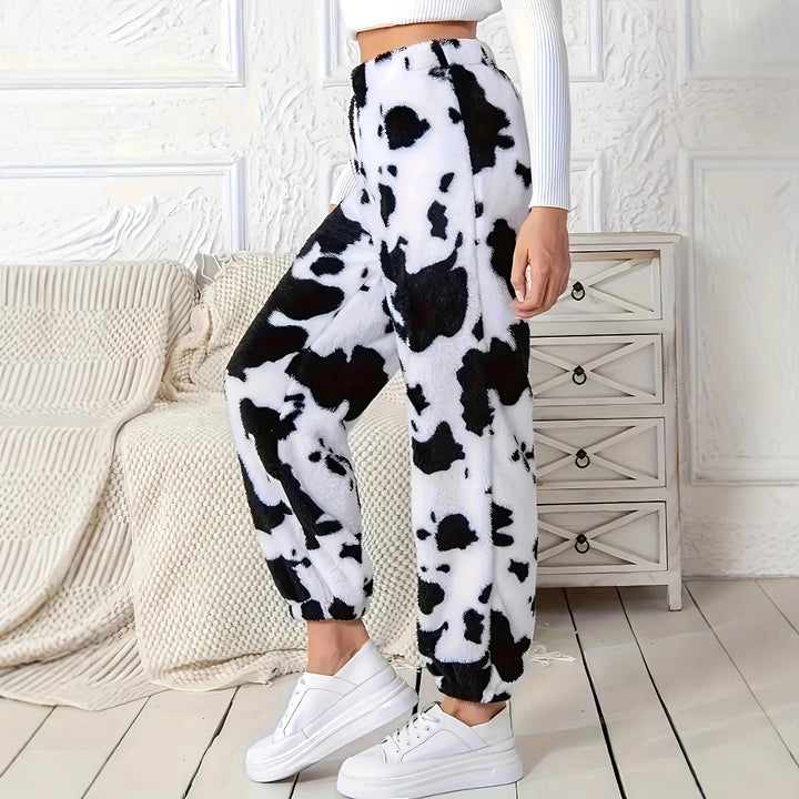 Women's plush pants with a trendy cow spot pattern and an elastic waist Lune London