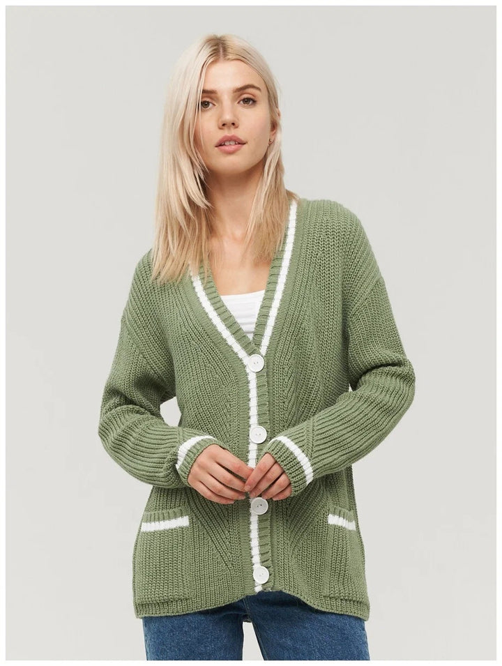 Ladies chunky knitted jacket with practical flap pockets and contrasting details Lune London