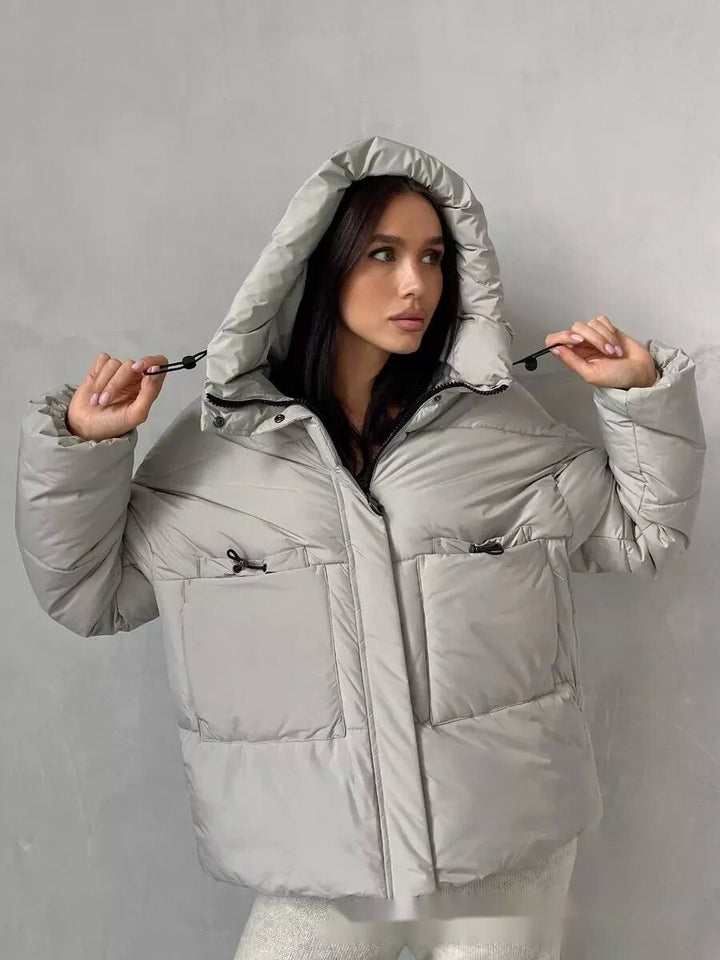 Sporty winter jacket for women with high collar and practical pockets Lune London