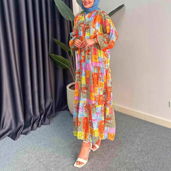 Maxi dress for women in boho style with a colorful patchwork design and wide sleeves Lune London