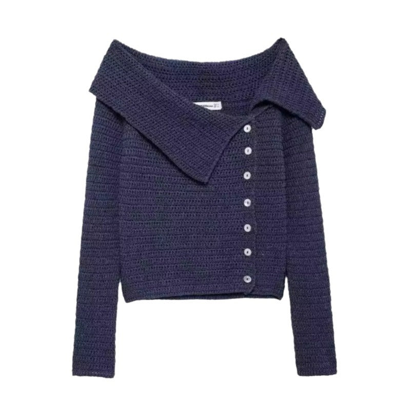 Elegant women's knitted vest with a deep collar and chic button details and style