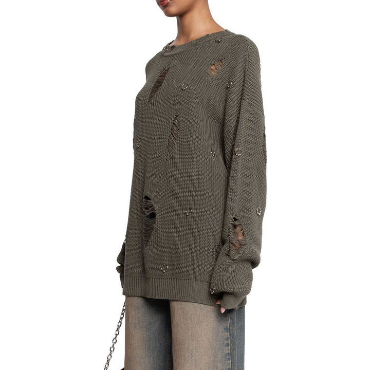 Casual sweater for women with trendy ripped details and decorative appliqués Lune London