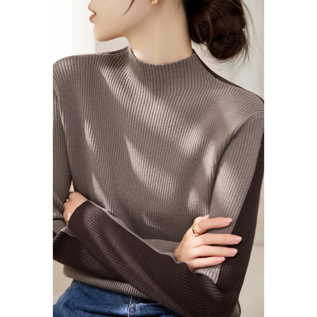 Pull à col roulé tendance pour femmes avec design en côtes texturées et manches contrastantes Chic & Stil