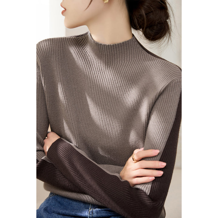 Pull à col roulé tendance pour femmes avec design en côtes texturées et manches contrastantes Chic & Stil