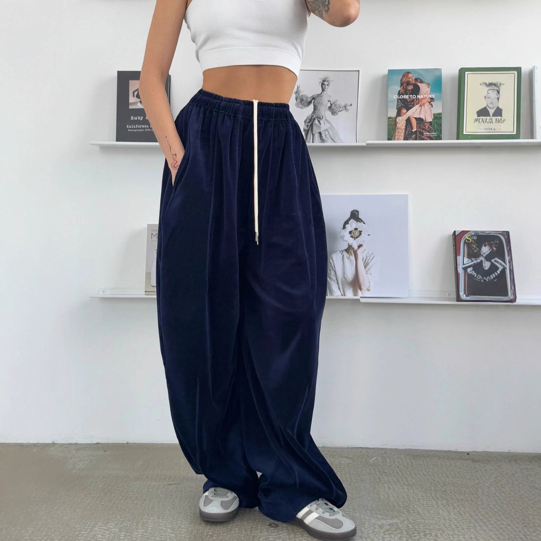Wide velvet pants for women with elastic waist and practical side pockets Lune London