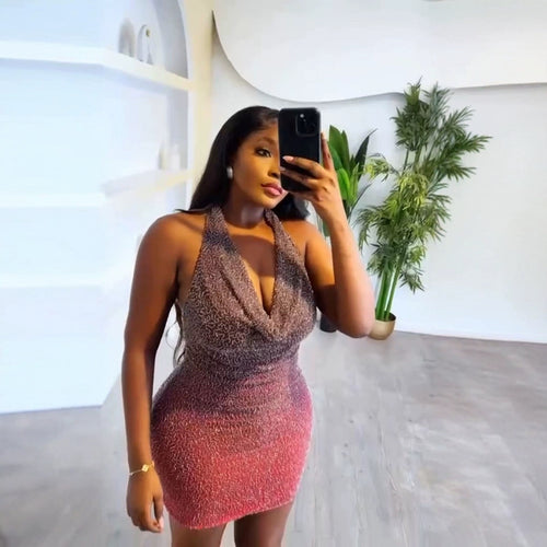 Women's Glamorous Party Dress in a figure-hugging design with a deep V-neckline and shimmering material