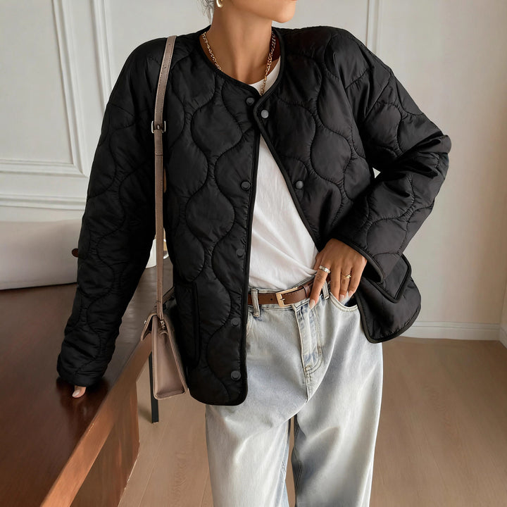 Veste matelassée pour femmes au design moderne et aux poches pratiques Chic & Stil