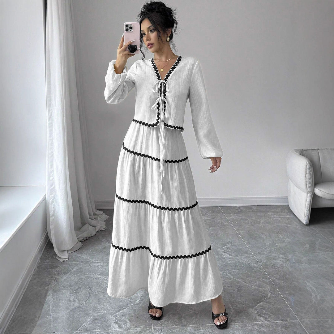 Maxi dress for women with playful lace-up neckline and elegant ruffled skirt Lune London