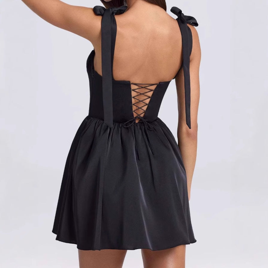 Airy summer dress for women with a pretty back cutout and charming bows Lune London