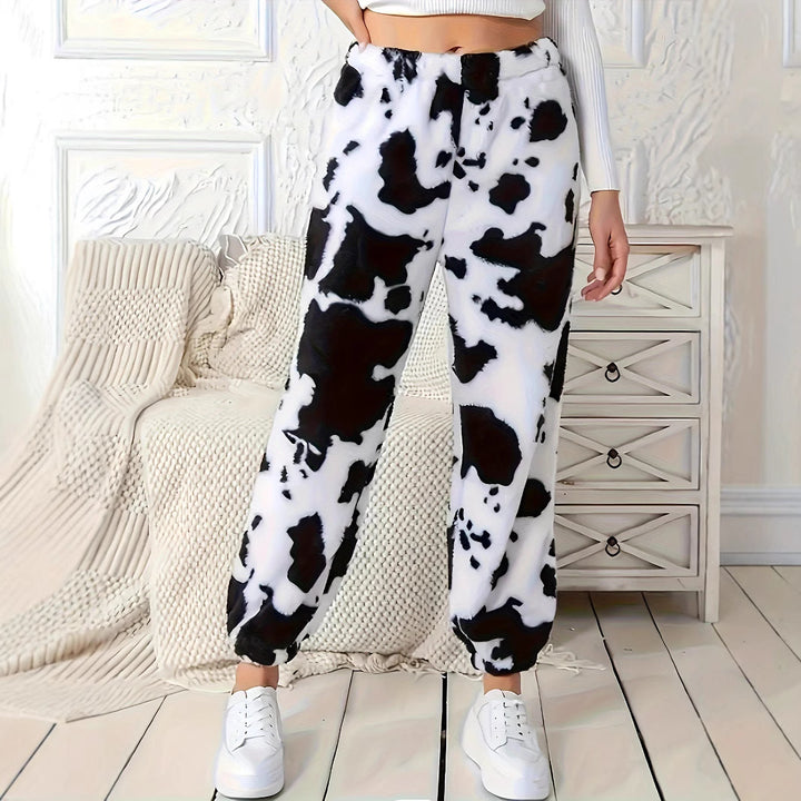 Women's plush pants with a trendy cow spot pattern and an elastic waist Lune London