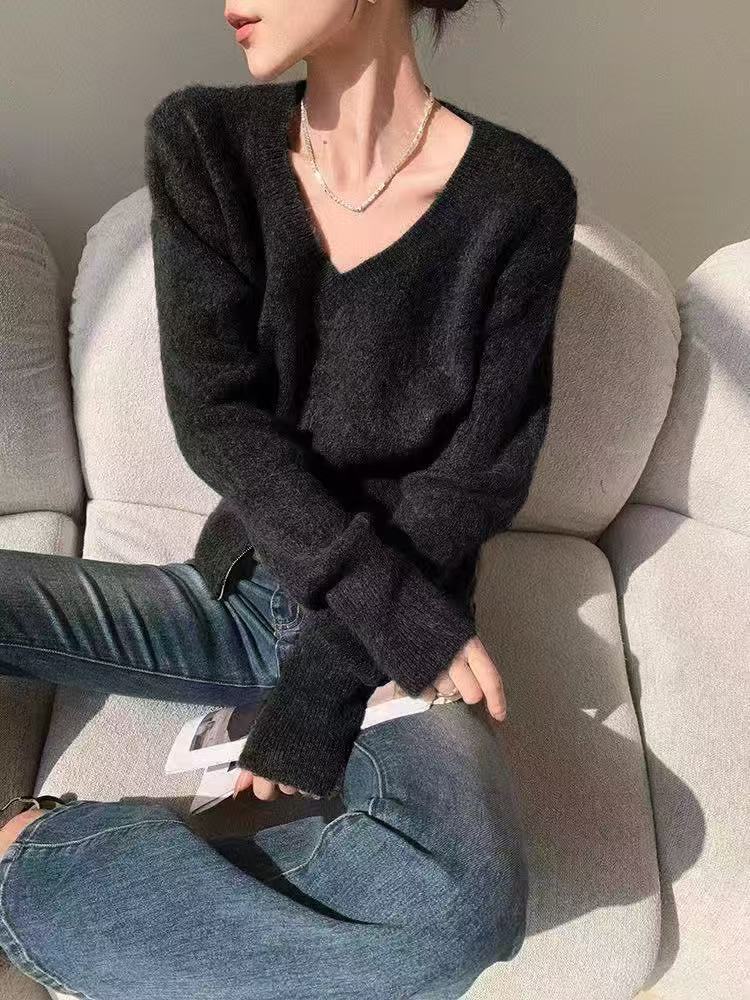 Cardigan féminin à la mode avec un décolleté en V profond et fermeture éclair Chic & Stil