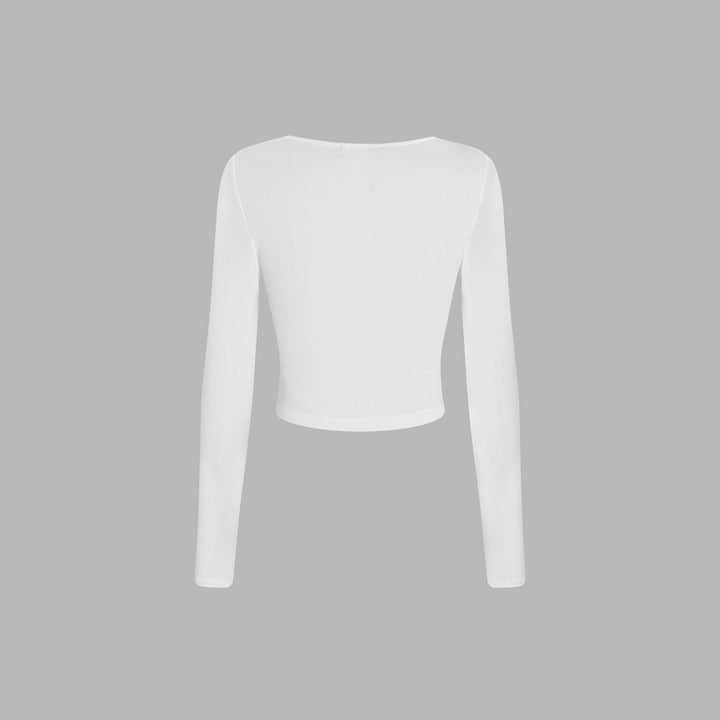 Cropped long sleeve blouse for women with a sophisticated draped design and trendy round neck Chic & Stil