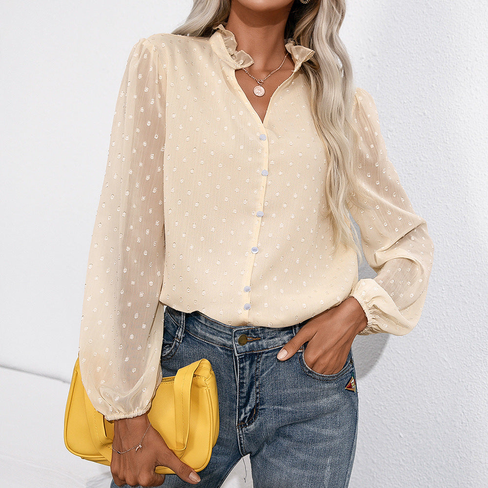 Ruffled blouse for women with sheer sleeves and a fine polka dot pattern Lune London