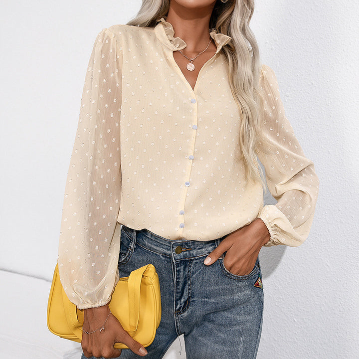 Ruffled blouse for women with sheer sleeves and a fine polka dot pattern Lune London