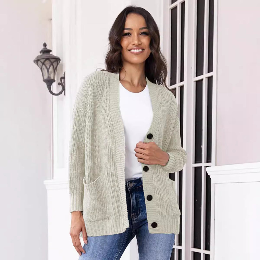 Ladies Chunky Knit Cardigan with practical pockets and classic button closure Lune London