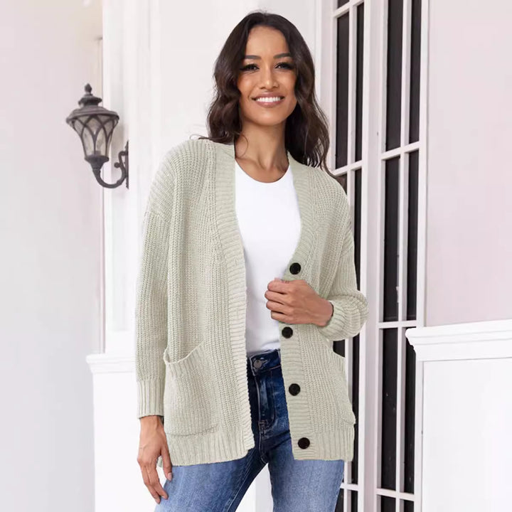 Ladies Chunky Knit Cardigan with practical pockets and classic button closure Lune London