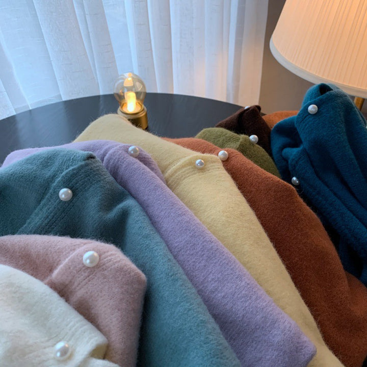 Cardigan femme avec élégants boutons en perles et design moderne Chic & Stil