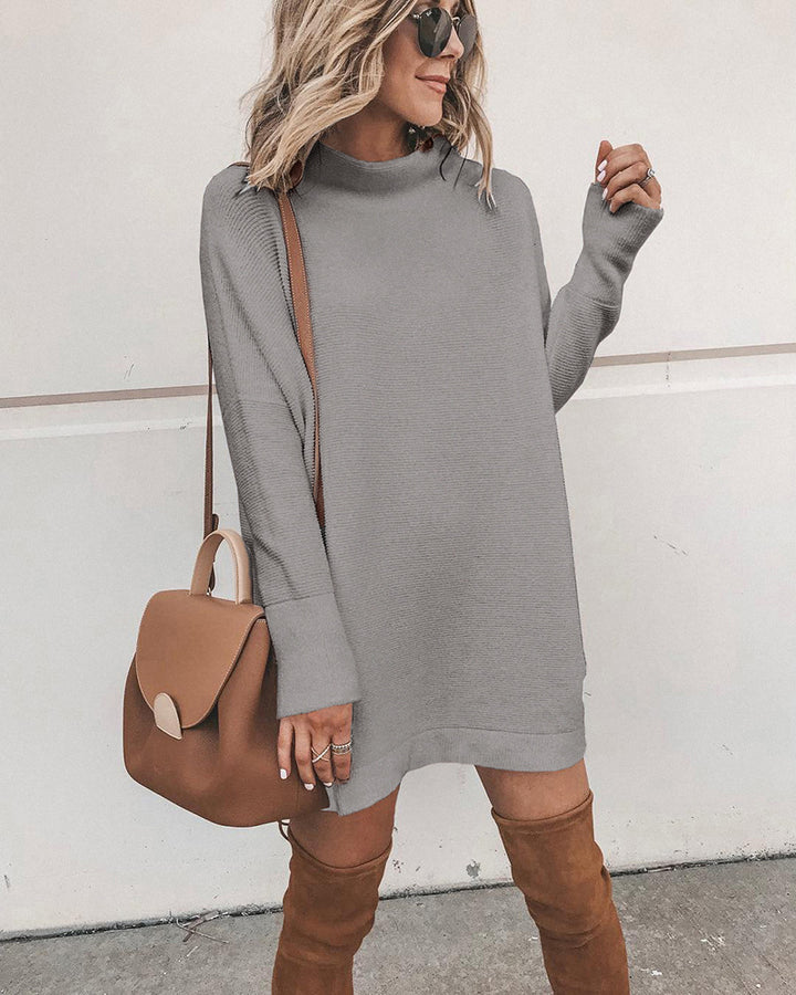 Oversized knitted dress for women with a high collar and puff sleeves Lune London