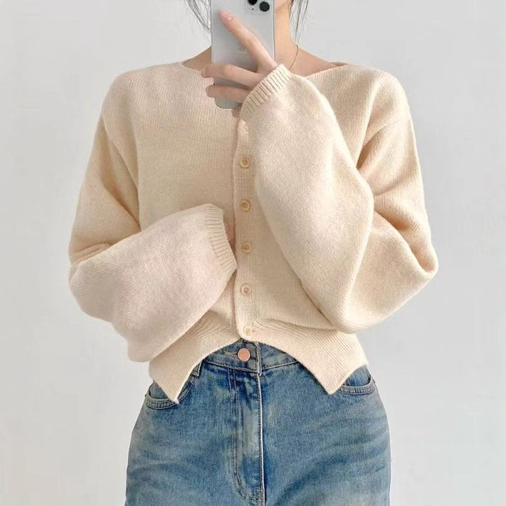 Cardigan court pour femmes avec patte de boutonnage et manches surdimensionnées Chic & Stil