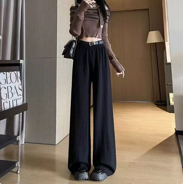 Pantalons femmes à jambes larges avec taille haute et finition soyeuse Chic & Stil
