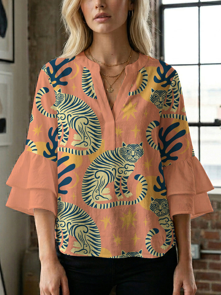 Ladies elegant blouse shirt with voluminous puff sleeves and graphic floral design Lune London