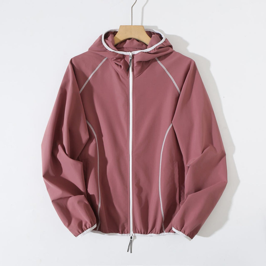 Veste coupe-vent légère pour femme avec un design de capuche innovant Chic & Stil