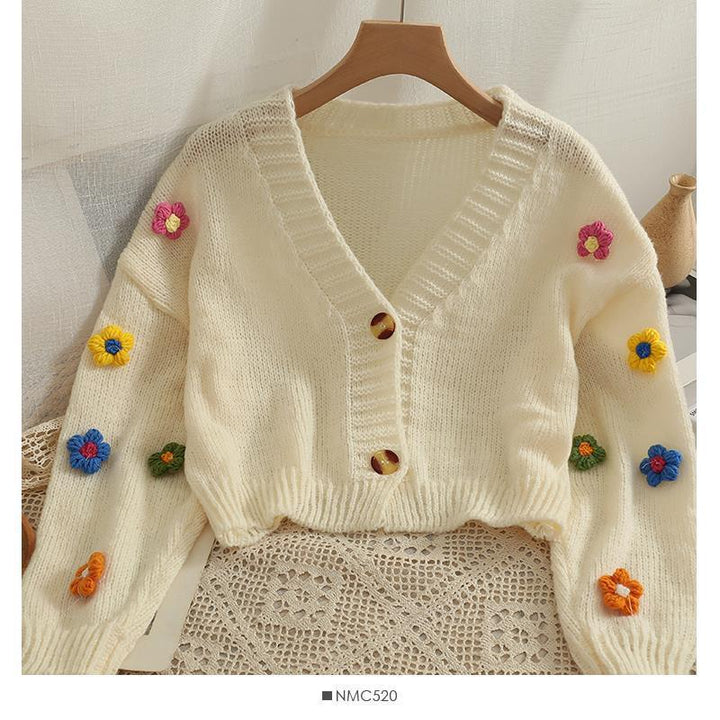 Ladies cozy knit cardigan with playful floral appliqués Lune London