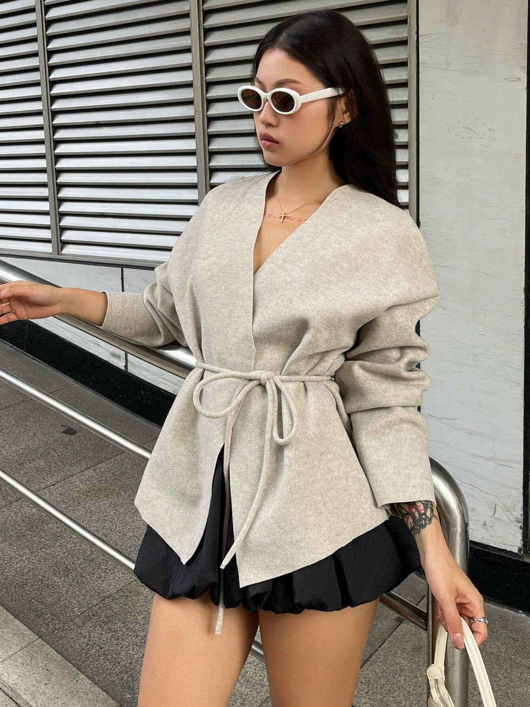 Women's lined wrap jacket with a modern cut and a belted waist Lune London