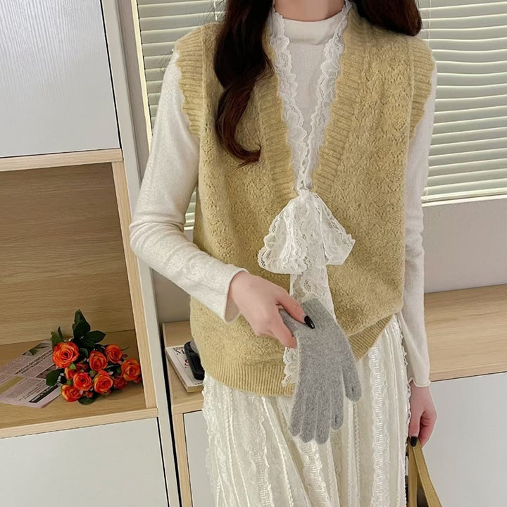 Gilet en tricot pour femmes avec détails de volants romantiques Chic & Stil