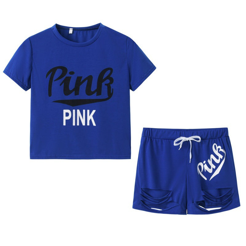 Ensemble t-shirt et short pour femmes sportif avec coupe décontractée et imprimés contrastés Chic & Stil