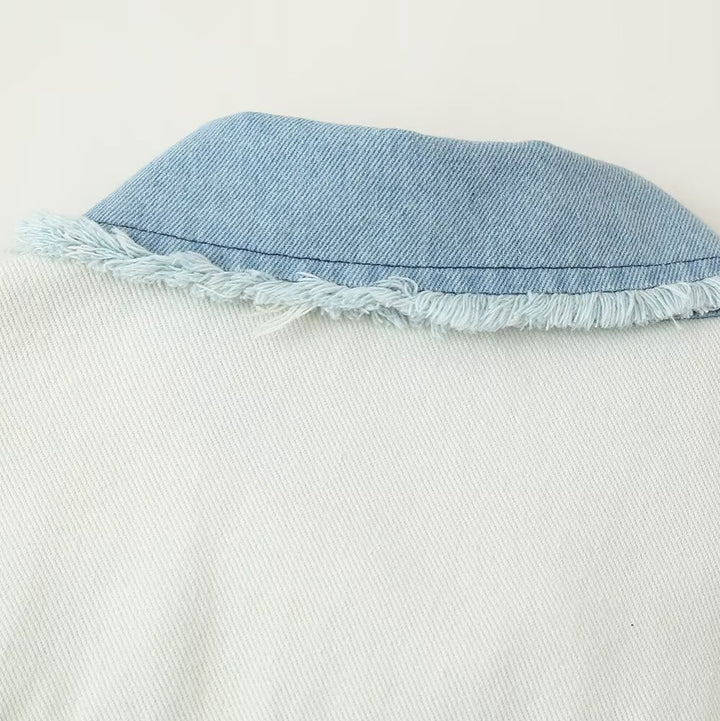 Cropped denim jacket for women with contrasting pockets and frayed hem Lune London