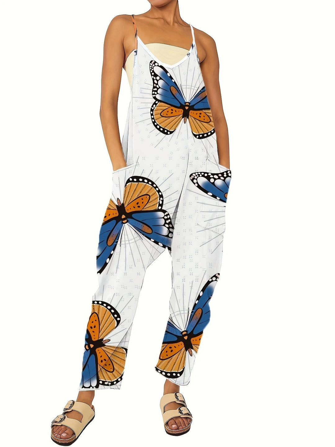Lady jumpsuit with colorful butterfly pattern and practical pockets Lune London