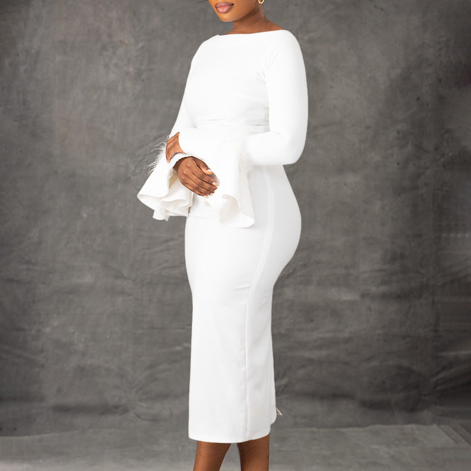 Sheath dress for women with trendy flutter sleeves and faux fur details Lune London