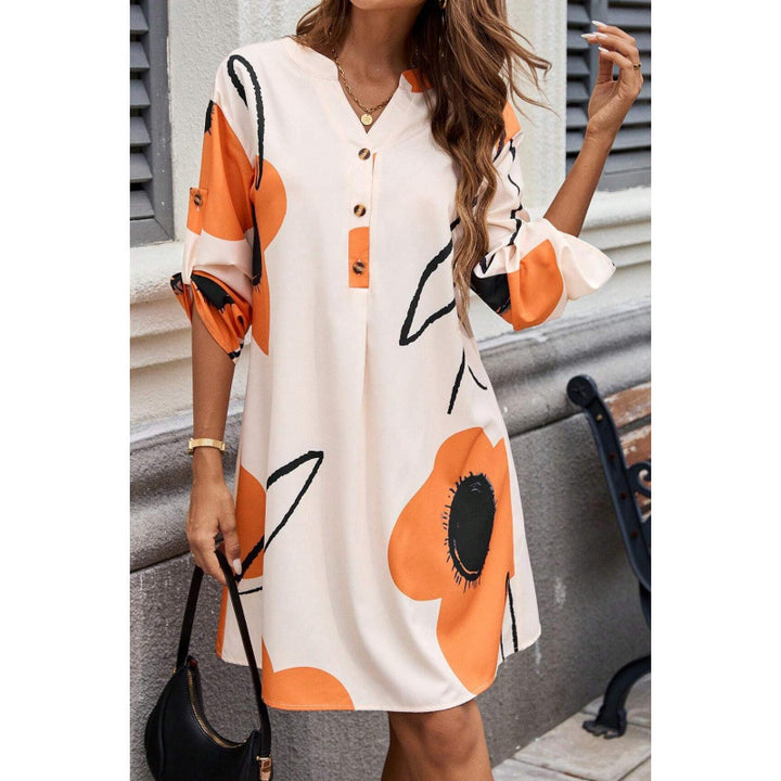 Leisure dress for women with a colorful graphic design and modern button details Lune London