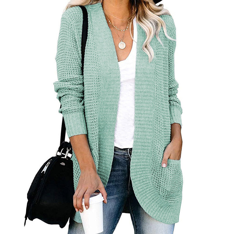 Women's knitted jacket with a loose fit and practical pockets Lune London