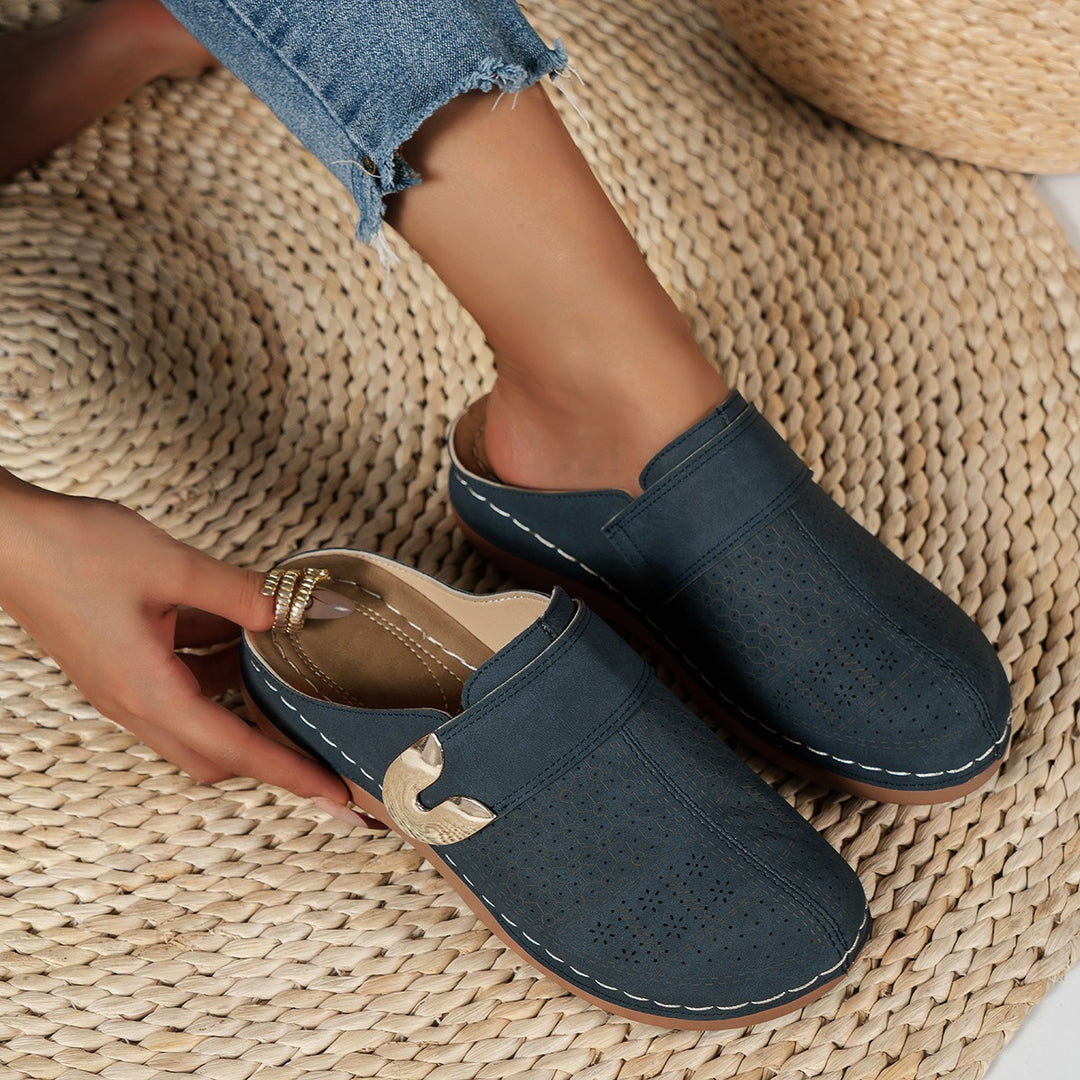 Women Breathable Clogs with trendy perforations and an adjustable strap Lune London