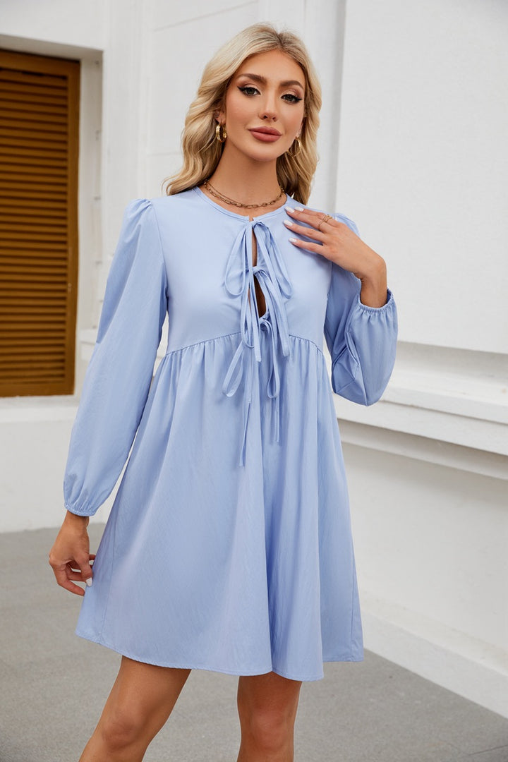 Fitted dress for women with knot opening and balloon sleeves Lune London