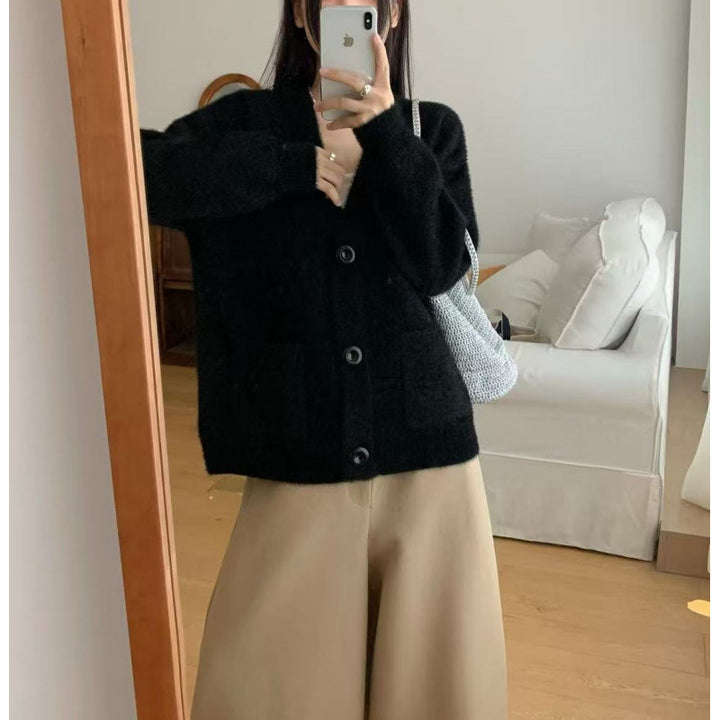 Cardigan pelucheux à boutons pour femmes avec poches élégantes Chic & Stil