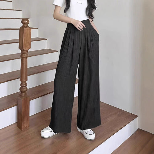 Wide pleated trousers for women with high pockets and elastic waist Lune London