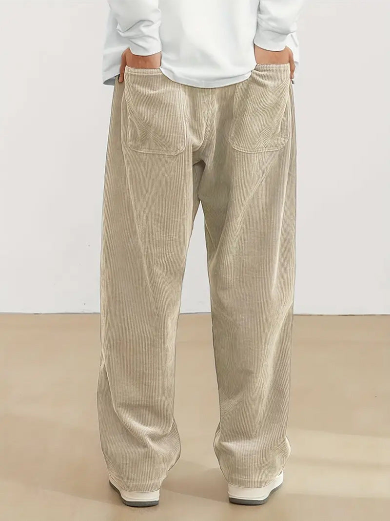 Women's wide corduroy trousers with elastic waistband and side pockets Chic & Stil