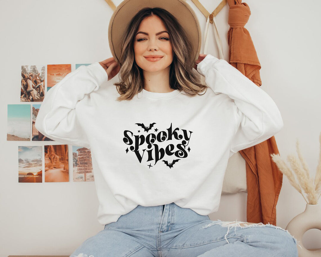 Sweat à capuche pour femmes avec un design Halloween ludique et une coupe confortable Chic & Stil