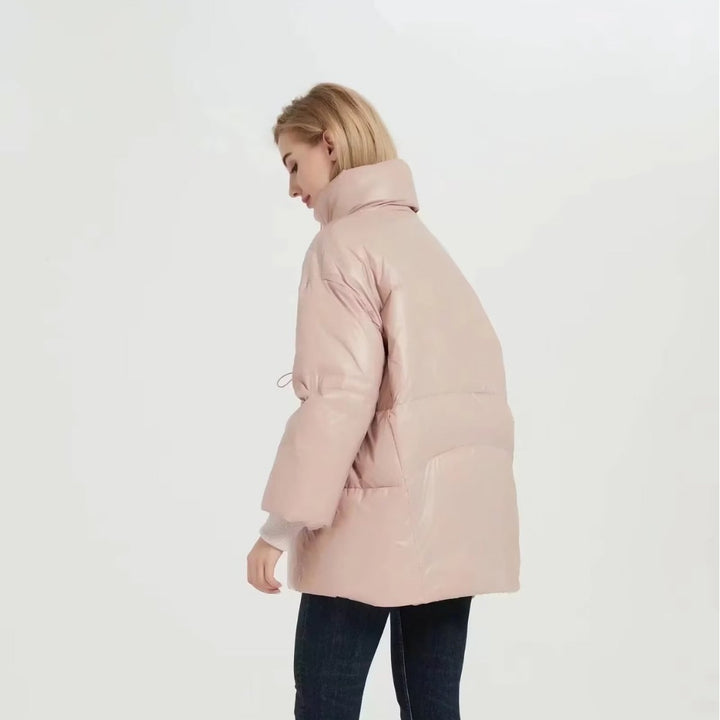 Quilted transition jacket for women with high collar and practical side pockets Lune London